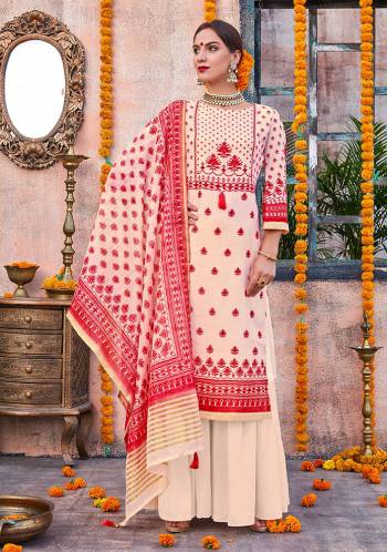 Flaunt Your Rich and Elegant Taste Wearing This Designer Suit In Cream And Red Color. Its Top Is Fabricated On Linen Paired With Cotton Fabricated Bottom And Chanderi Fabricated Dupatta. This Pretty Suit Is Suitable For Your Semi-Casuals Or Festive Wear. 