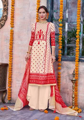 Flaunt Your Rich and Elegant Taste Wearing This Designer Suit In Cream And Red Color. Its Top Is Fabricated On Linen Paired With Cotton Fabricated Bottom And Chanderi Fabricated Dupatta. This Pretty Suit Is Suitable For Your Semi-Casuals Or Festive Wear. 