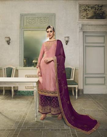 Get Ready For This Wedding And Festive Season With This Beautiful Designer Lehenga Or Plazzo Suit, You Can Get This Stitched In Either Of The Ways. This Pretty Suit Is In Pink Colored Top Paired With Magenta Pink Colored Bottom And Dupatta. Its Top Is Fabricated On Satin Silk Paired With Jacquard Silk Bottom And Georgette Fabricated Stone Work Dupatta. Buy This Lovely Piece Now.