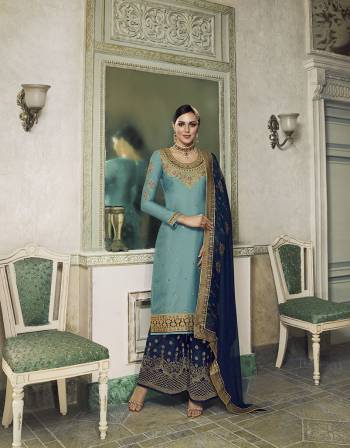 Here Is A Very Beautiful Designer Suit In Blue Colored Top Paired With Royal Blue Colored Bottom And Dupatta. This Semi-Stitched Suit Can Be Made As Lehenga Suit Or Plazzo Suit, Either Way You Like. Its Top Is Fabricated On Satin Silk Beautified With Detailed Embroidery Paired With Jacquard Silk Fabricated Bottom And Georgette Fabricated Stone Work Dupatta. 