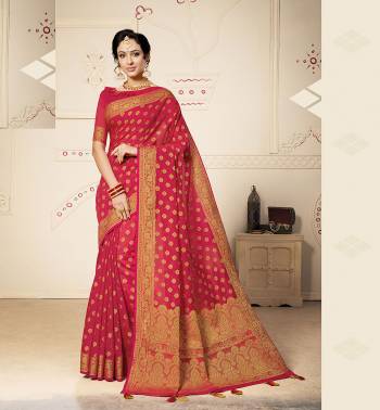 Flaunt Your Rich And Elegant Taste Wearing This Lovely Silk Based Saree In Rani Pink Color. This Saree Is Fabricated On Banarasi Art Silk Paired With Art Silk Fabricated Blouse, It Is Beautified With Pretty Weave. Buy Now