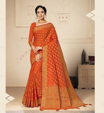 Here Is A Beautiful Designer Silk Based Saree In Orange Color. This Pretty Weaved Saree Is Fabricated On Banarasi Art Silk Paired With Art Silk Fabricated Blouse. Buy This Saree Now.