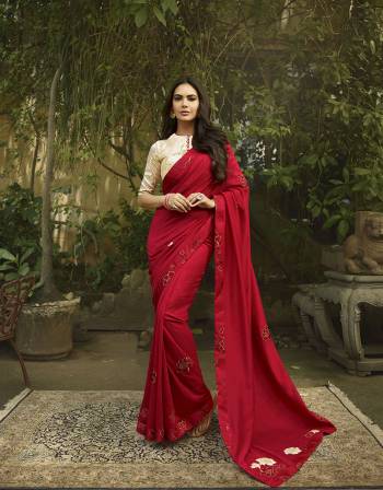 Enhance Your Personality Wearing This Designer Saree In Red Color Paired With Cream Colored Blouse. This Saree And Blouse Are Silk Based Beautified With Minimal Thread Work. Buy Now.