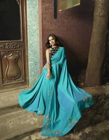 Celebrate This Festive Season With Beauty And Comfort Wearing This Rich And Elegant Looking Designer Saree In Blue Color. This Saree And Blouse Are Silk Based Giving A Rich Look To Your Personality. 