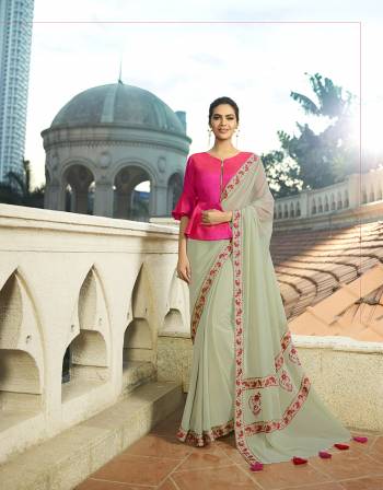 Enhance Your Personality Wearing This Designer Saree In Pastel Green Color Paired With Rani Pink Colored Blouse. This Saree And Blouse Are Silk Based Beautified With Minimal Thread Work. Buy Now.