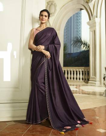 Shine Bright Wearing This Attractive Designer Saree In Dark Purple Color Paired With Baby Pink Colored Blouse. This Saree And Blouse Are Silk Based With Deatiled Thread Work. 