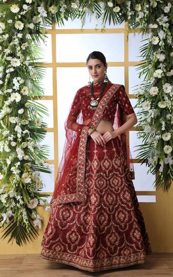 You Will Definitely Earn Lots Of Complimets Wearing This Heavy Designer Lehenga Choli In All Over Maroon Color. This Heavy Embroidered Lehenga Choli Is Silk Based Paired With Net Fabricated Dupatta, It Is Beautified With Lovely Detailed Embroidery Giving An Attractive Look. 