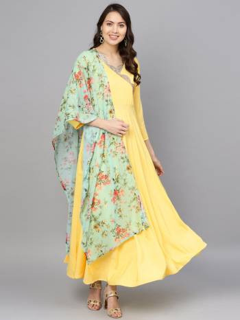 Grab This Beautiful Pair Of Readymade Gown In Lemon Yellow Color Paired With Pastel Green Colored Digital Printed Dupatta. This Pretty Gown Is Crepe Based Paired With Georgette Fabricated Dupatta. It Is Available In All Regular Sizes And its Fabric Ensures Superb Comfort all Day Long. 