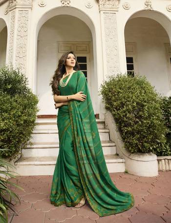 Here Is A Pretty Printed Saree For Your Semi-Casuals In Sea Green Color. This Saree Is Fabricated On Georgette Paired With Art Silk Fabricated Blouse. It Is light In Weight And Easy To Drape. Buy This pretty Saree Now.