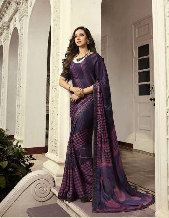 For Your Semi-Casual Wear, Grab This Pretty Saree In Purple Color. This Printed Saree Is Fabricated On Georgette Paired With Art Silk Fabricated Blouse. Its Fabric Is Durable And Easy To Care For. 