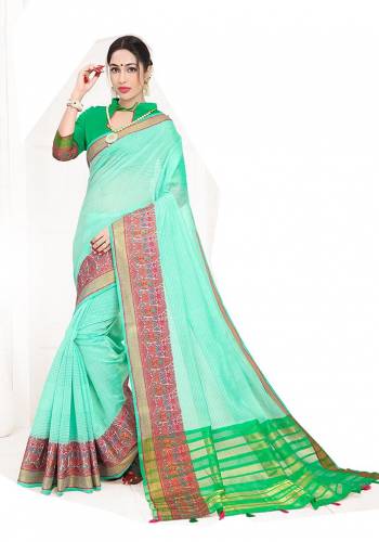 Celebrate This Festive Season Wearing This Designer Silk Based Saree In Sea Green Color. This Saree Is Fabricated On Cotton Silk Paired with Art Silk Fabricated Blouse Beautified With Weave. It Is Light Weight, Durable And Easy To Carry All Day Long. Buy Now?