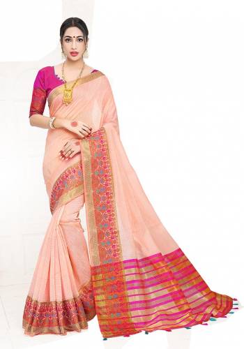 Enhance Your Personality Wearing This Silk Based Saree In Peach Color Paired With Dark Pink Colored Blouse. This Pretty Weaved Saree Is Fabricated On Cotton Silk Paired With Art Silk Fabricated Blouse. Buy Now