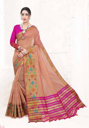 Flaunt Your Rich And Elegant Taste Wearing This Lovely Silk Based Saree In Dusty Peach Color Paired With Contrasting Rani Pink Colored Blouse. This Saree Is Fabricated On Cotton Silk Paired With Art Silk Fabricated Blouse Beautified With Weave. Buy Now