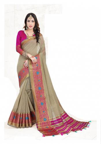Adorn A Proper Traditional Look This Festive Season Wearing This Pretty Saree In Grey Color Paired With Magenta Pink Colored Blouse. This Saree Is Fabricated on Cotton Silk Paired With Art Silk Fabricated Blouse. Buy This Lovely Saree Now