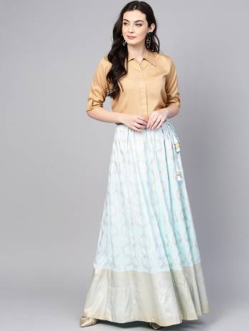 New And Unique Trending Pair Of Top With Skirt Is Here In Beige Colored Shirt Paired With Baby Blue Colored Skirt. This Readymade Pair Is Fabricated On Poly Silk And Avialble In All Regular Sizes. 