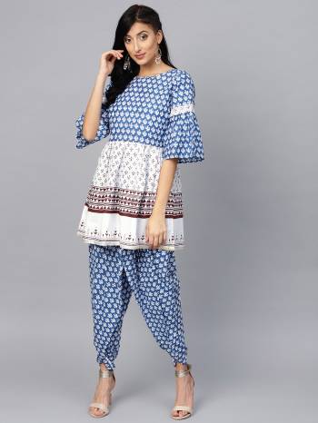 Simple And Elegant Looking Readymade Pair Of Top And Dhoti Is Here In Blue And White Color. This Pretty Printed Pair Is Fabricated On Cotton Which Is Durable And Easy To Care For. 