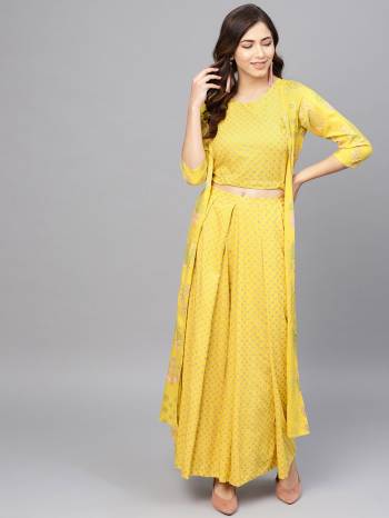 Celebrate This Festive Season With Beauty And Comfort Wearing This Designer Readymade Indo-Western Pair In All Over Yellow Color. Its Top, Bottom And Shrug Are Fabricated Rayon Beautified With Prints. Buy This Pair Now.