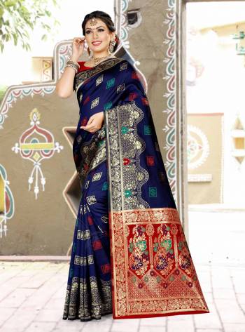 Grab This Designer Silk Based Saree In Navy Blue Color Paired With Contrasting Red Colored Blouse. This Saree And Blouse Are Fabricated On Banarasi Art Silk Beautified With Weave All Over. Buy Now.