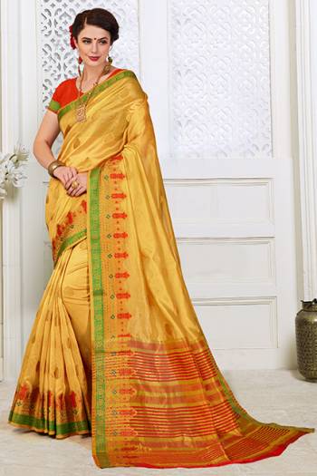 Here Is A Very Pretty Designer Silk based Saree In Yellow Color Paired With Contrasting Orange Colored Blouse . This Lovely Weaved Saree Is Fabricated On Cotton Silk Paired With Art Silk Fabricated Blouse. It Is Light Weight, Durable And Easy To Carry All Day Long. 