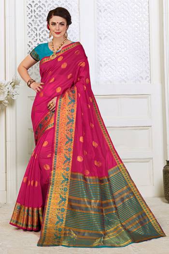 Celebrate This Festive Season With Beauty And Comfort In This Lovely Rani Pink Color Saree Paired With Contrasting Blue Colored Blouse. This Saree Is Cotton Silk Based Paired with Art Silk Fabricated Blouse. Buy This Lovely Weaved Saree Now.