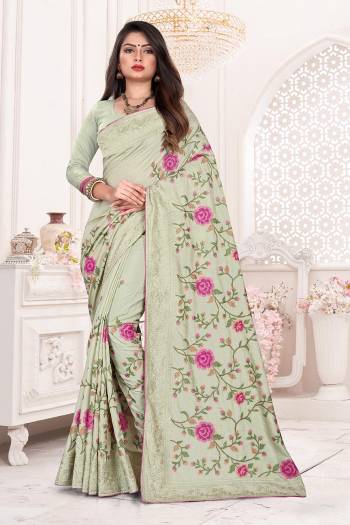 Add This Very Beautiful And Heavy Designer Saree To Your Wardrobe In Pastel Green Color For The Upcoming Wedding And Festive Season. This Saree And Blouse Are Fabricated on Dola Art Silk Detailed Thread Work With Tone To Tone Embroidered Lace Border. Buy Now.