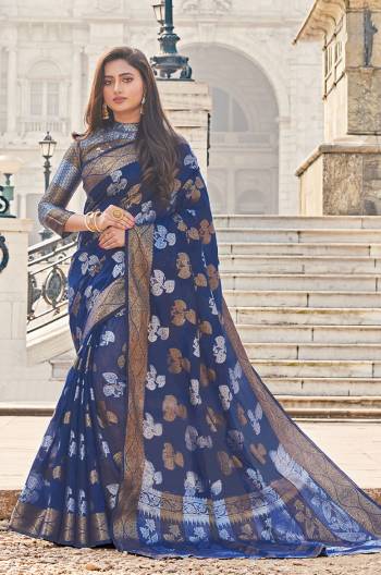 Classy Saree look pretty like never before.Wearing this Navy Blue Color Saree which made from Cotton Handloom With Navy Blue Color Jacquard Silk blouse, Saree has also decorative work like Heavy Zari Work With Woven.This beautiful Saree features a classy Zari Work all over,which makes it a smart pick for all occasions. 