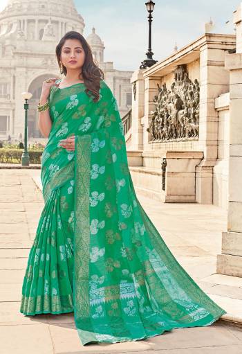 Classy Saree look pretty like never before.Wearing this Green Color Saree which made from Cotton Handloom With Green Color Jacquard Silk blouse, Saree has also decorative work like Heavy Zari Work With Woven.This beautiful Saree features a classy Zari Work all over,which makes it a smart pick for all occasions. 