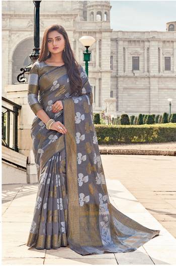 Classy Saree look pretty like never before.Wearing this Grey Color Saree which made from Cotton Handloom With Grey Color Jacquard Silk blouse, Saree has also decorative work like Heavy Zari Work With Woven.This beautiful Saree features a classy Zari Work all over,which makes it a smart pick for all occasions. 