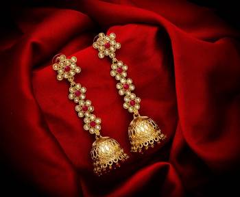 Here Is A New And Unique Designer Patterned Long Jhumka Style Earrings Which Can Pair Up With A Simple Kurti, Straight Suit Or Saree. It Is Light In Weight And Easy To carry Throughout The Gala.