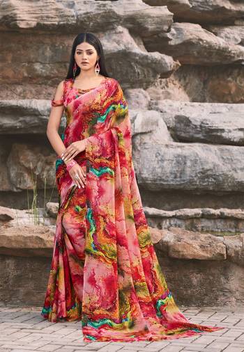 Go Colorful With This Lovely Printed Saree In Pink And Dark Pink Color. This Pretty Saree And Blouse Are Fabricated On Chiffon. It Is Light In Weight And Easy To Carry All Day Long. 