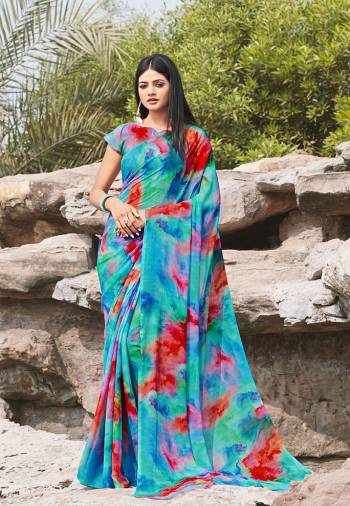 Celebrate This Festive Season With Beauty And Comfort Wearing This Lovely Colorful Saree In Blue Color. This Saree And Blouse Are Chiffon Based Which IS Light Weight, Durable And Easy To Care For.