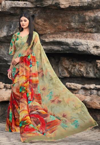Go Colorful With This Lovely Printed Saree In Light Green And Multi Color. This Pretty Saree And Blouse Are Fabricated On Chiffon. It Is Light In Weight And Easy To Carry All Day Long. 