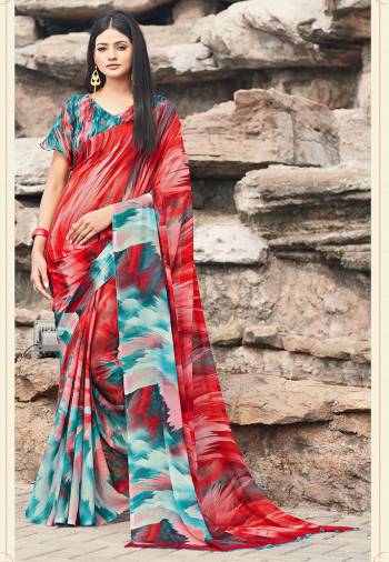 Celebrate This Festive Season With Beauty And Comfort Wearing This Lovely Colorful Saree In Red And Blue Color. This Saree And Blouse Are Chiffon Based Which IS Light Weight, Durable And Easy To Care For.
