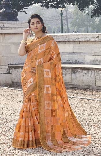 Rich Traditional Looking Designer Saree Is Here In Orange Color. This Lovely Weaved Saree And Blouse Are Fabricated On Handloom Cotton. This Saree Is Suitable For All Occasion Wear And Even For Weddings By Pairing It With Heavy Jewellery. Buy Now.