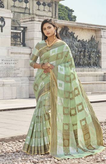 Rich Traditional Looking Designer Saree Is Here In Pastel Green Color. This Lovely Weaved Saree And Blouse Are Fabricated On Handloom Cotton. This Saree Is Suitable For All Occasion Wear And Even For Weddings By Pairing It With Heavy Jewellery. Buy Now.