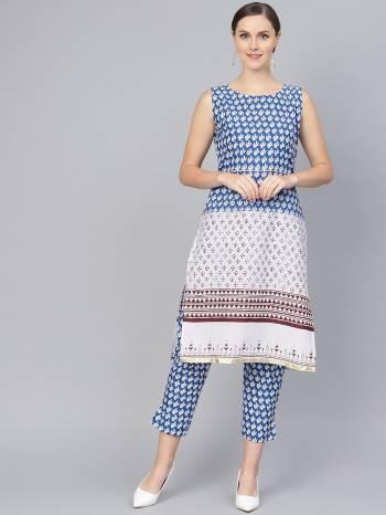 For Your Casual Or Semi-Casual Wear, Grab This Readymade Pair Of Kurti Set In White And Blue. This Readymade Set IS Fabricated On Cotton Beautified With Prints. Its Fabric Is Cool And Ensures Superb Comfort all Day Long. 