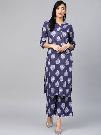 Enhance Your Personality Wearing This Readymade Kurti In Navy Blue Color Paired With Navy Blue Colored Bottom. This Readymade Printed Pair Is Fabricated Muslin Which Is Light Weight And Soft Towards Skin .