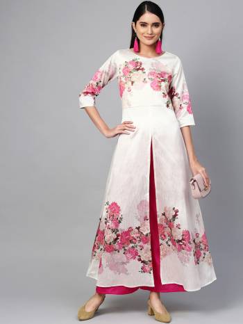 Simple and Elegant Looking Readymade kurti Is Here In White Color Paired With Dark Pink Colored Readymade Bottom. This Pair Is Fabricated On Poly Silk Beautified With Pretty Floral Prints. 