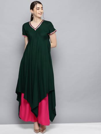 Look Attractive With This Pretty Readymade Kurti And Bottom In Dark Green And Rani Pink Color Respectively. This Beautiful Pair Is Fabricated On Rayon Beautified With Pretty Lace. 