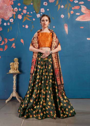 For The Upcoming Festive And Wedding Season, Here Is A Perfect Designer Lehenga Choli In Orange Colored Blouse Paired With Dark Green Colored Lehenga And Beige & Multi Colored Dupatta. This Lehenga Choli Is Silk Based Paired With Tussar Art Silk Fabricated Dupatta. It Pretty Digital Prints Will Earn You Lots Of Compliments From onlookers. 