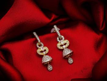 Here Is A Very Pretty Pair Of Simple And Elegant Looking Earring?Set In Golden Color. It Has Pretty Unique pattern With Attractive Diamond Work. You can Pair This Even With Simple Attire As Well As A Heavy One. This Pretty Evergreen Design Compliments Any Kind Of Attire You Wear.