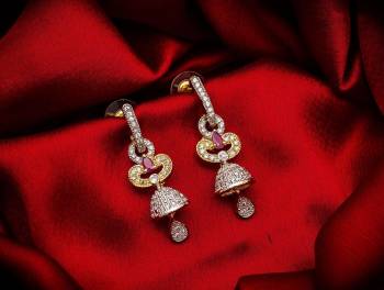 Here Is A Very Pretty Pair Of Simple And Elegant Looking Earring?Set In Golden Color. It Has Pretty Unique pattern With Attractive Diamond Work. You can Pair This Even With Simple Attire As Well As A Heavy One. This Pretty Evergreen Design Compliments Any Kind Of Attire You Wear.