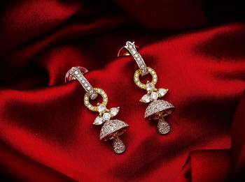 Here Is A Very Pretty Pair Of Simple And Elegant Looking Earring?Set In Golden Color. It Has Pretty Unique pattern With Attractive Diamond Work. You can Pair This Even With Simple Attire As Well As A Heavy One. This Pretty Evergreen Design Compliments Any Kind Of Attire You Wear.