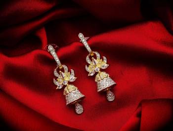 Here Is A Very Pretty Pair Of Simple And Elegant Looking Earring?Set In Golden Color. It Has Pretty Unique pattern With Attractive Diamond Work. You can Pair This Even With Simple Attire As Well As A Heavy One. This Pretty Evergreen Design Compliments Any Kind Of Attire You Wear.