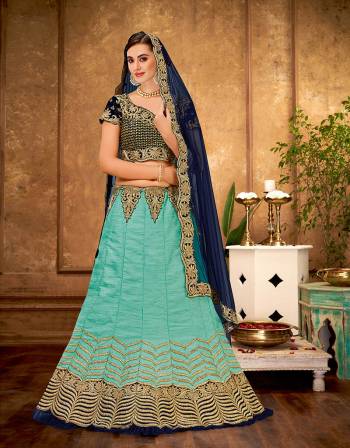 This ornately embroidered lehenga is a rhythmic and modern approach to conventional designs. Embedded with delicate floral details and a touch of metallic thread, this lehenga emits magnificence. 