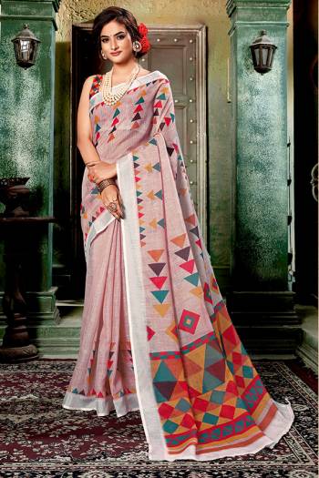 Flaunt Your Rich And Elegant Taste Wearing This Pretty Digital Printed Saree In Dusty Pink Color Paired With Multi Colored Blouse. This Saree And Blouse Are Fabricated On Linen Cotton Which Gives A Rich Look To Your Personality