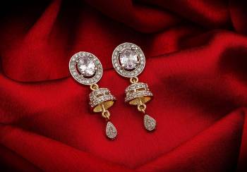 Here Is A Very Pretty Pair Of Simple And Elegant Looking Earring?Set In Golden Color. It Has Pretty Unique pattern With Attractive Diamond Work. You can Pair This Even With Simple Attire As Well As A Heavy One. This Pretty Evergreen Design Compliments Any Kind Of Attire You Wear.