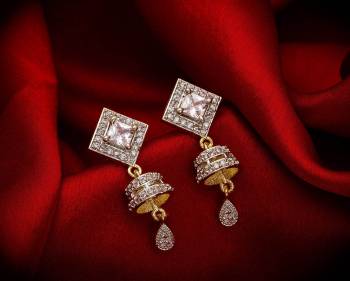 Here Is A Very Pretty Pair Of Simple And Elegant Looking Earring?Set In Golden Color. It Has Pretty Unique pattern With Attractive Diamond Work. You can Pair This Even With Simple Attire As Well As A Heavy One. This Pretty Evergreen Design Compliments Any Kind Of Attire You Wear.