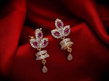 Here Is A Very Pretty Pair Of Simple And Elegant Looking Earring?Set In Golden Color. It Has Pretty Unique pattern With Attractive Diamond Work. You can Pair This Even With Simple Attire As Well As A Heavy One. This Pretty Evergreen Design Compliments Any Kind Of Attire You Wear.