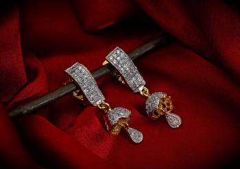 Here Is A Very Pretty Pair Of Simple And Elegant Looking Earring?Set In Golden Color. It Has Pretty Unique pattern With Attractive Diamond Work. You can Pair This Even With Simple Attire As Well As A Heavy One. This Pretty Evergreen Design Compliments Any Kind Of Attire You Wear.